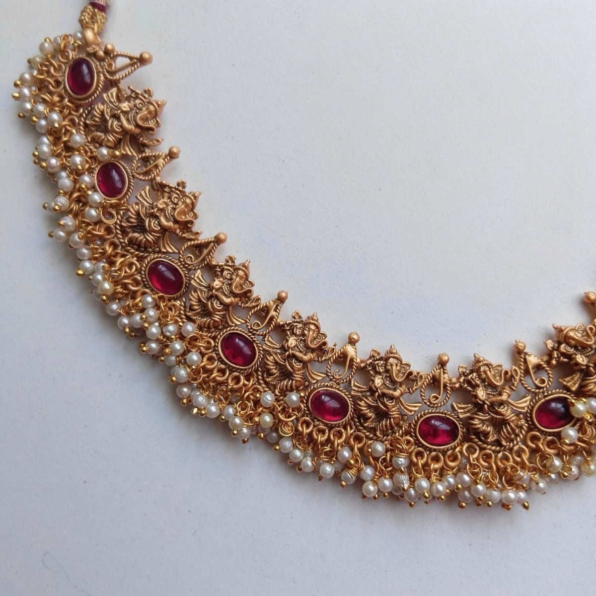 VEDHA TEMPLE GOLD TONED ANTIQUE FINISH NECKLACE WITH EARRINGS NL176