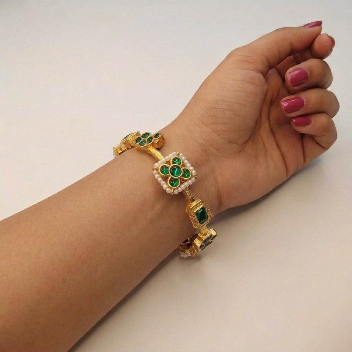 YAMINI GOLD TONED BRASS BANGLES BR214