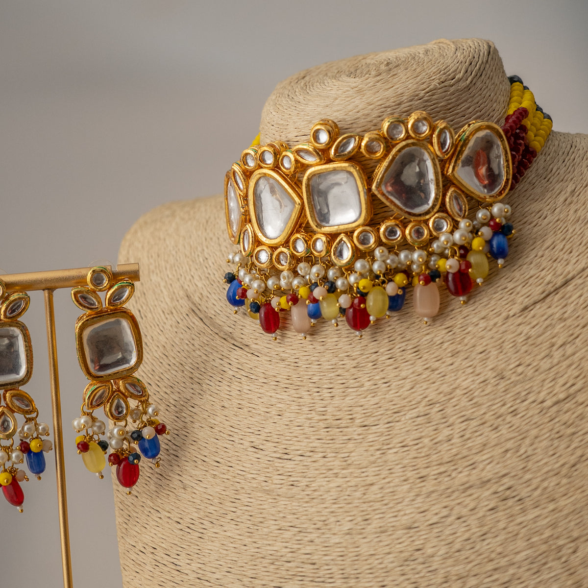 MOI FAUX KUNDAN AND BEADS HANDMADE GOLD TONED CHOKER WITH EARRINGS CH410