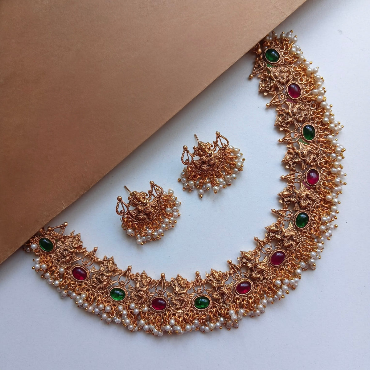 DHARSHU TEMPLE GOLD TONED ANTIQUE FINISH NECKLACE WITH EARRINGS NL175