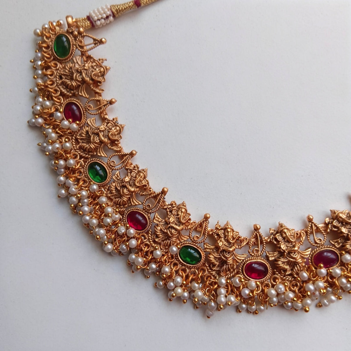 DHARSHU TEMPLE GOLD TONED ANTIQUE FINISH NECKLACE WITH EARRINGS NL175