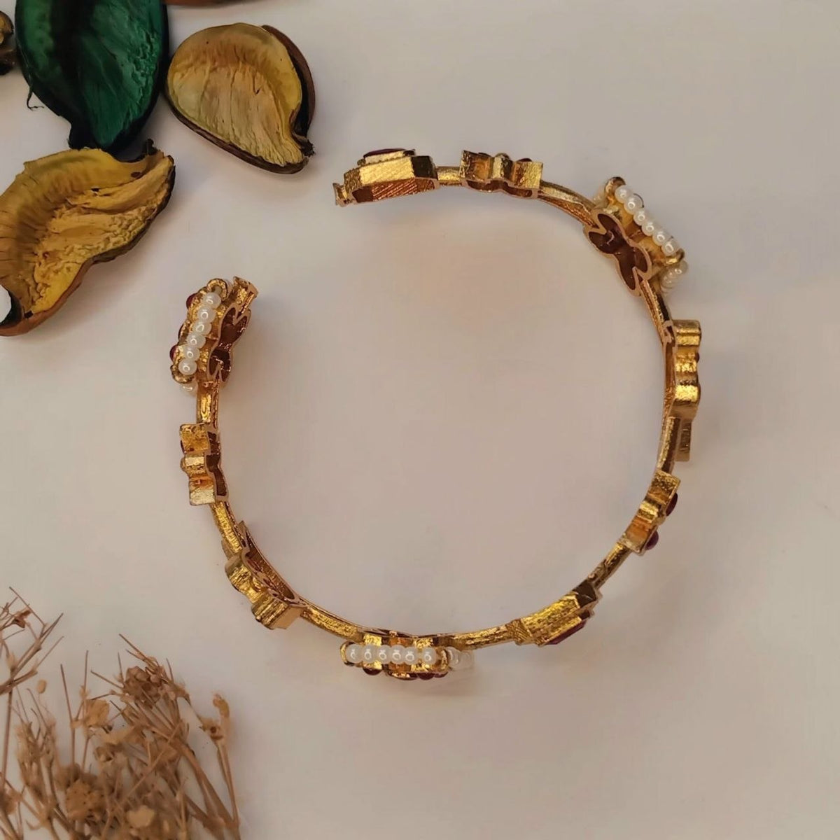 YAMINI GOLD TONED BRASS BANGLES BR214
